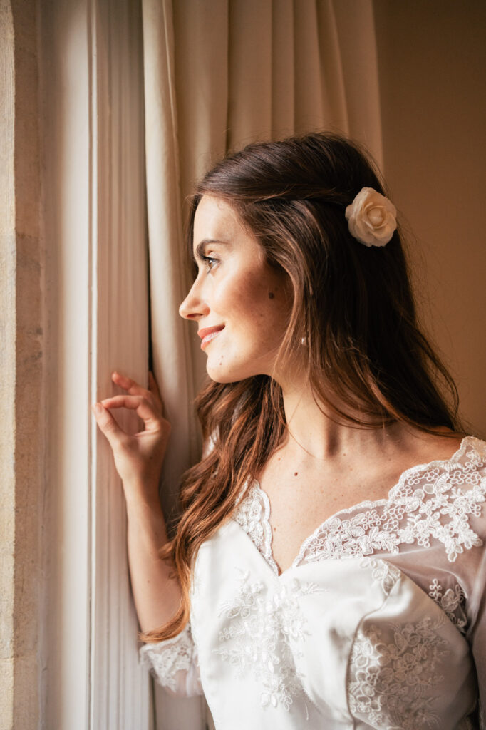 bride looking out of window