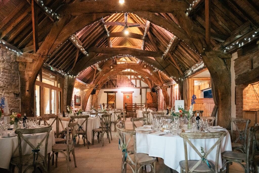 Barn wedding venue, Notley Tythe Barn, set up for a wedding reception